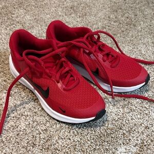 Nike Red Athletic Sneakers with Black Swoosh